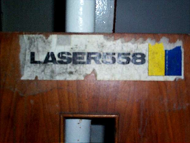 Laser 558 sticker on cupboard door