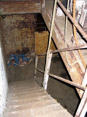 Intermediate level looking down stairs