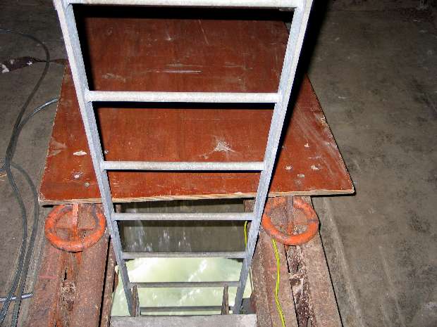 Inside at top of ladder