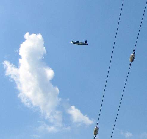 Low flying aircraft buzzing