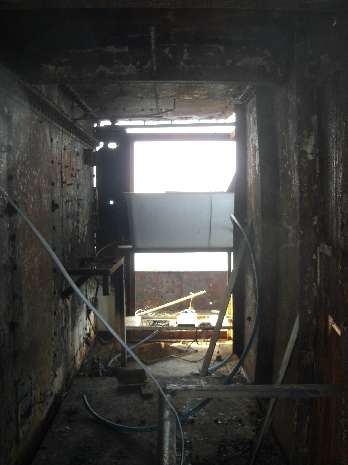 North leg area beyond door