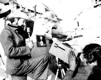 Dave Simser on camera by gun